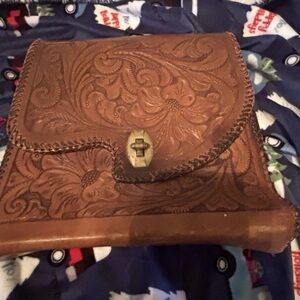 Vintage tooled leather clutch bag